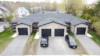 Four-Plex For Sale! 4 Tenanted Bungalows with Garages! Image# 1