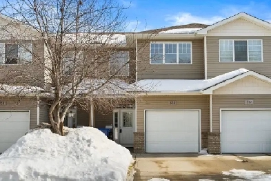 321 Pickard St N - Charming Townhouse In Normanview Image# 1