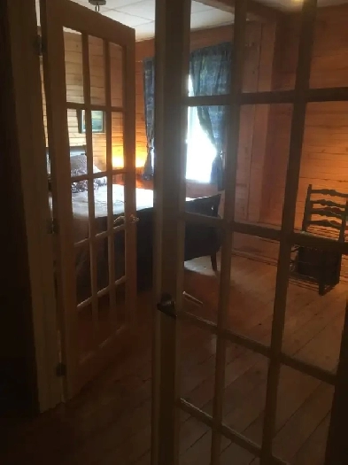 SUPERBE CONDO 3 1/2 EN MONTAGNE SUR LE BORD DU LAC ST-SAUVEUR Image# 1