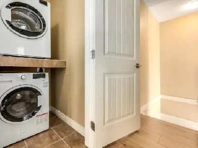 One Bedroom, One Bathroom, Private Coach House (over Garage) Image# 1