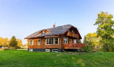 1/4 section with 5 bed 3 Bath home in beautiful Montney, BC. Image# 2