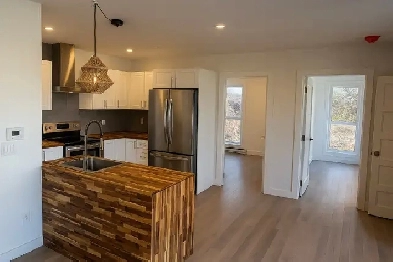 À louer – Superbe condo NEUF 4 ½ avec garage intérieur! Image# 1