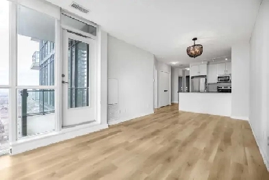 1 1 Huge Sunny & Bright condo with parking & storage. Image# 1