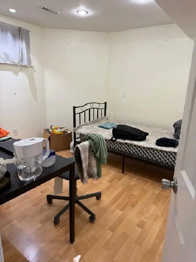 Shared furnished room in basement rental for male. Image# 1