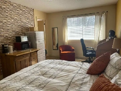 Room with private bathroom and kitchenette Image# 1