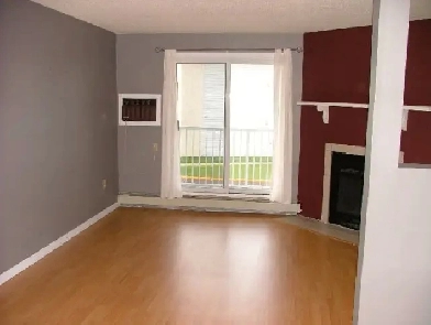 2 BDRM Condo Heat and Water included with in-suite laundry, Pool Image# 3