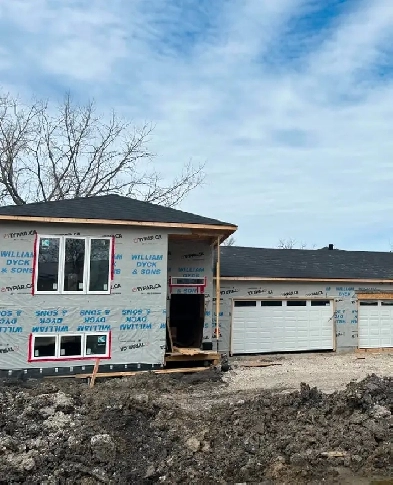 BI-LEVEL STYLE CONDO HOME W/BASEMENT AND DOUBLE ATTACHED GARAGE Image# 3