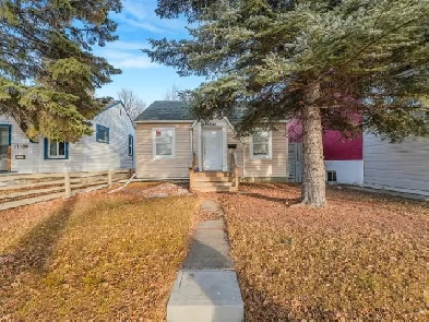 33x125 Lot with livable house and single garage! Land bank here! Image# 1