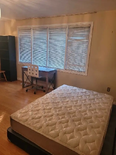 Furnished room rental with car parking Image# 1