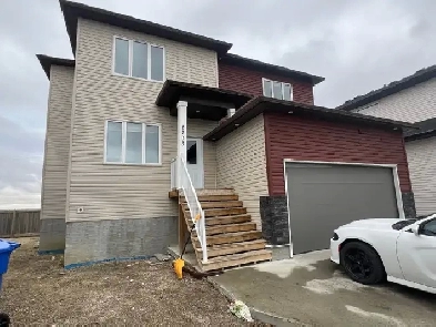 OPEN HOUSE - 5703 Glide Cres. - Home with Basement Suite Image# 1