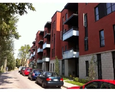 Magnifique 4 1/2 semi-meublé, stationnement intérieur et casier. Image# 1