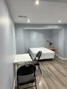 Furnished 1-bedroom   1Den Basement Apartment for Rent Image# 1