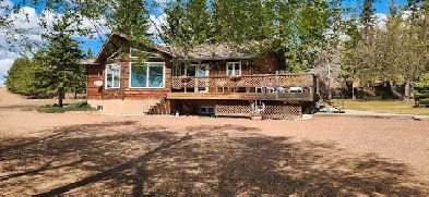 Prime riverfront 36 acres, home and shop Image# 1