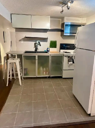 Reno'd. rooms in bsmt apt. Utilities included, clean,large Image# 2