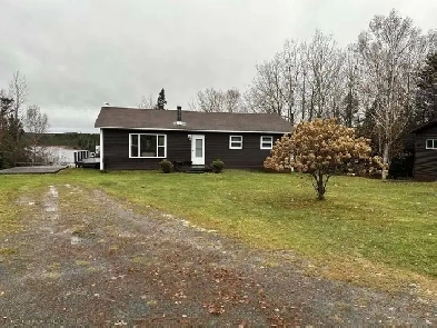 Nestled on a sprawling lot, charming one-level bungalow Image# 3