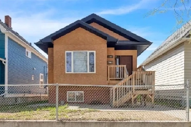 Beautiful Bi-Level with Legal Suite For Sale or For Trade! Image# 1