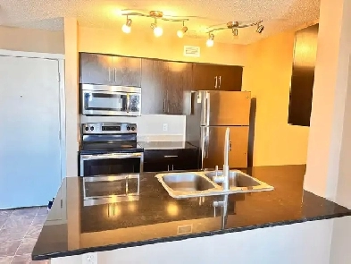 TOP Floor Condo 2 Bed   2 Baths   Den   2 Parking in Walker Area Image# 1