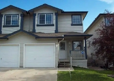 GREAT VALUE! 3 Bdrm Duplex with GARAGE!!By Clareview LRT. Image# 1