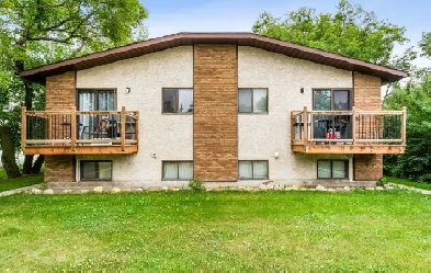Very clean & newly updated two level suite in a quiet four-plex Image# 1