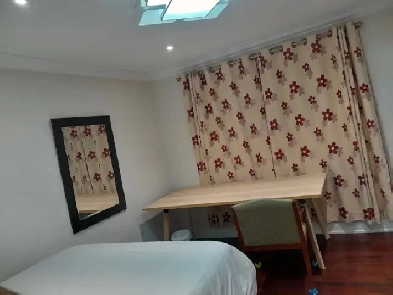 A private daily suite inn with an attached bathroom Image# 1