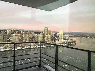 Beautiful fully furnished two bedroom waterfront condo Image# 1