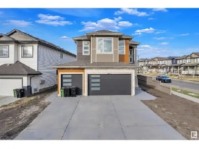 Massive Family Home w/ Legal 2-Bed Suite & Triple Garage Image# 1