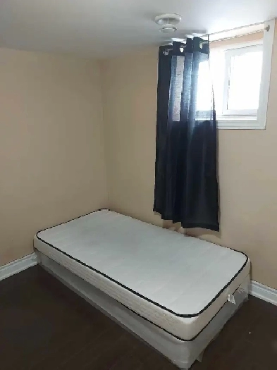 Private room with attached washroom in the basement Image# 6