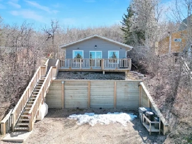Fully Furnished Lake Retreat with Creek Views & Wraparound Deck Image# 8
