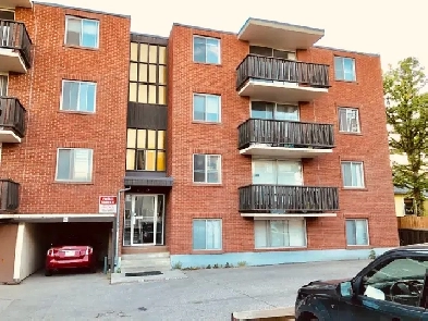 Outdoor parking stall in Kensington for rent, 2 min walk to LRT Image# 1