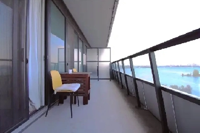 Fully furnished unobstructed lake view waterfront 2bedroom condo Image# 3