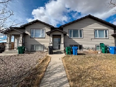 JUST LISTED | West Side Townhome with NO Condo Fees! Image# 9