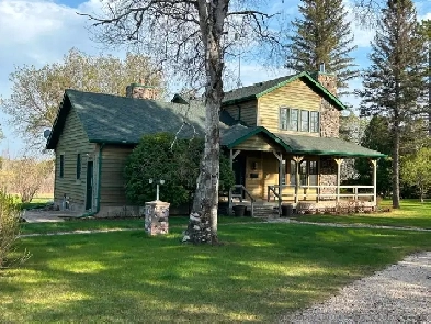 SS MAY 18...BEAUTIFUL WATERFRONT ON PINAWA CHANNEL..22 ACRES!! Image# 1