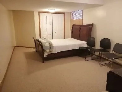 a spacious cozy basement rental Image# 1