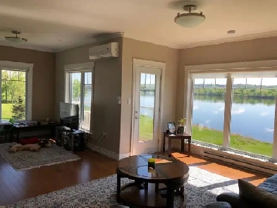 Luxury Condo Unit- Waterfront and Long-Lasting River View Image# 2