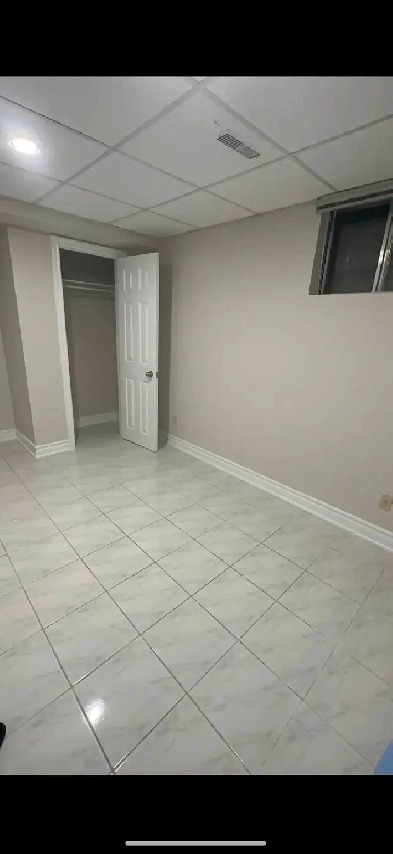 A private bright room in the basement near SquareOne for Rent Image# 1