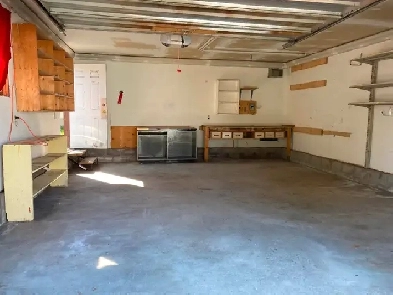 Large detached garage available for storage in Beddington. Image# 1