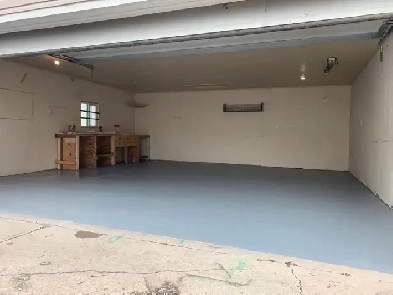 Double over sized heated garage for rent Image# 1
