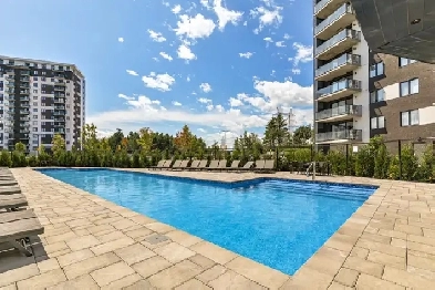 Magnifique Condo neuf 2 cac et balcon avec vue! Garage! Image# 1