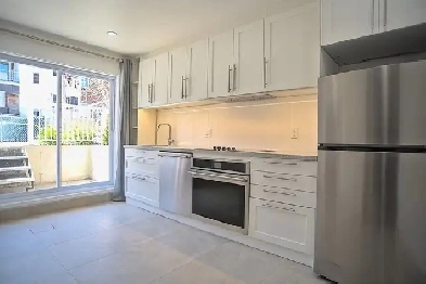 Très beau 4 1/2 entièrement rénové - lumineux Image# 1