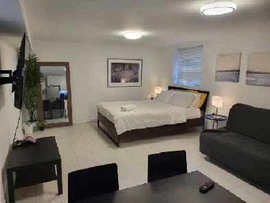 Bright & modern fully furnished apartment with free utilities Image# 5