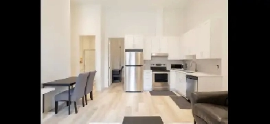 Bright Modern Unit in Central Burnaby with 14' Ceilings Image# 1