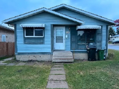 3 bedroom main floor house close to school, bus stop, day care. Image# 2