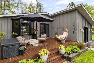 ~Fully Renovated 4-season Retreat in the Heart of Lagoon City~ Image# 1