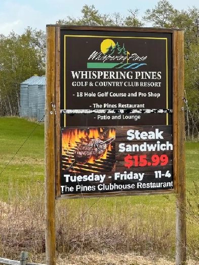 Beautiful landscaped lot in Phase 5 of Whispering PInes Image# 1