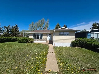 RE19143 Real Estate Auction - 100 Wood Crescent, Assiniboia, SK Image# 1