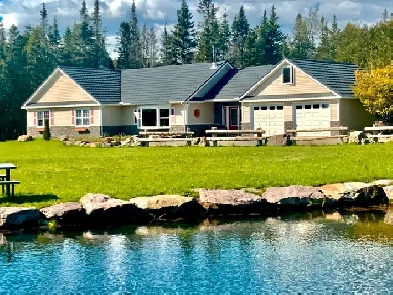 Exclusive custom built home and shop on 10  acres and 3 ponds. Image# 8