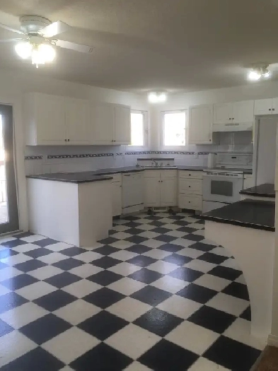 West Side Main Floor Suite - UTILITIES INCLUDED-Available July 1 Image# 2