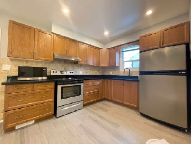 RENOVATED 4 BDRM @ ROGERS/ CALEDONIA! Image# 2