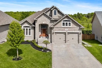 KNG Presents Custom Built Bungalow Backing onto Butternut Creek Image# 7
