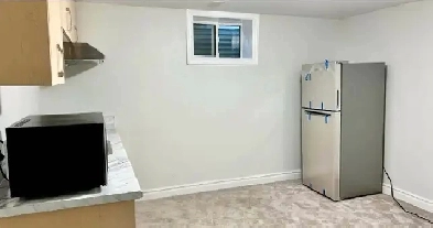 Furnished basement One Bedroom unit Image# 5